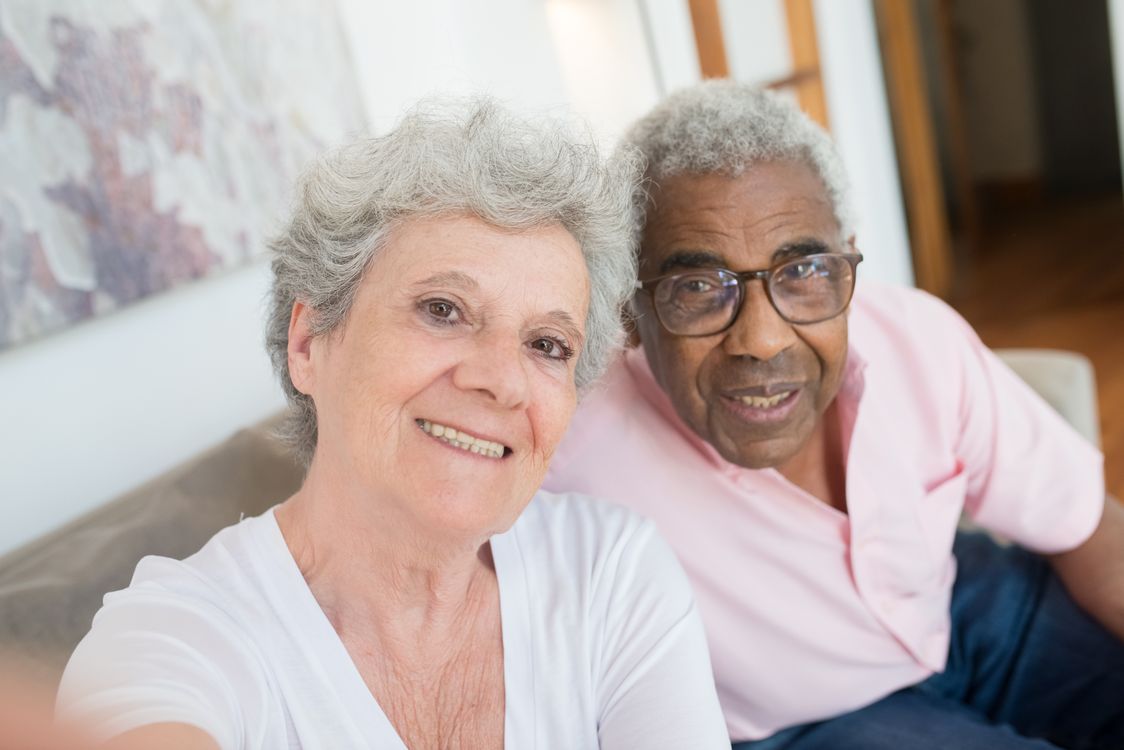 An older couple together at home